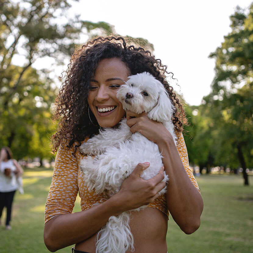 Lady Outdoors With Her Dog